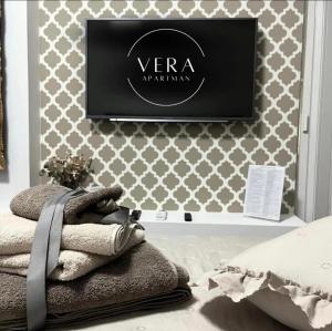 Cama o camas de una habitación en VERA apartman