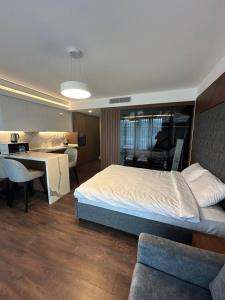 Ένα ή περισσότερα κρεβάτια σε δωμάτιο στο Studio Grand Sapphire Resort