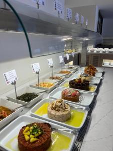 a buffet line with many different types of desserts at Sundia By Liberty Suncity in Oludeniz