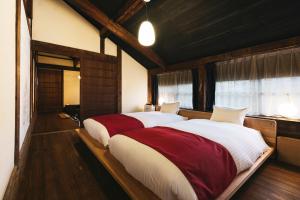 Postel nebo postele na pokoji v ubytování PAAK Hotel