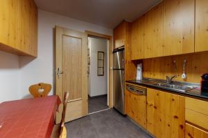 Kuchyň nebo kuchyňský kout v ubytování Apartment Pradè