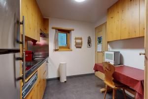 Kuchyň nebo kuchyňský kout v ubytování Apartment Pradè