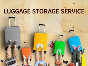 a group of people with luggage on the floor at Comfort Hotel Tokyo Kanda in Tokyo