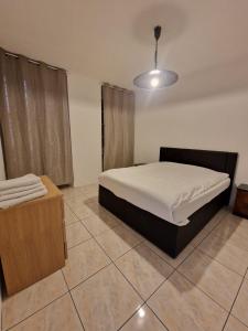 Postel nebo postele na pokoji v ubytování Casa Noelia & Dairi