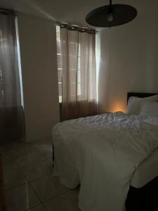 Ένα ή περισσότερα κρεβάτια σε δωμάτιο στο Casa Noelia & Dairi +1 φωτογραφίες