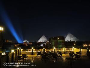 Fotografija v galeriji nastanitve The View Pyramids Gold one v Kairu