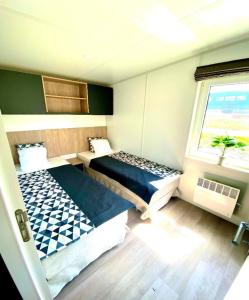 Katil atau katil-katil dalam bilik di Sommer Chalet 26