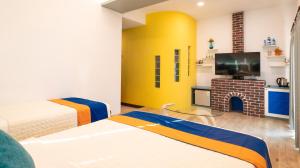 Rúm í herbergi á Ocean Star B&B