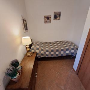 Postel nebo postele na pokoji v ubytování Appartamenti Il Capomandro