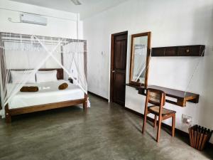 Ένα ή περισσότερα κρεβάτια σε δωμάτιο στο Sky House Ahangama +63 φωτογραφίες