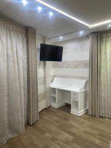 TV a/nebo společenská místnost v ubytování Charming Seaside Apartment in Nice