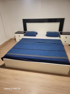 Postel nebo postele na pokoji v ubytování Chambre privée chez l'habitant