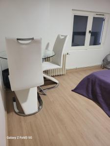Posezení v ubytování Chambre privée chez l'habitant