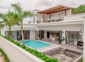 an image of a house with a swimming pool at Bang Tao Villa - Menara Hill in Phuket Town
