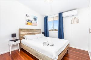 Voodi või voodid majutusasutuse Capricorn Views Yeppoon toas