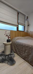 Postel nebo postele na pokoji v ubytování Leaf apartment