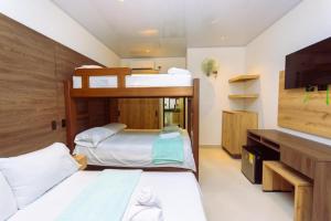 Postel nebo postele na pokoji v ubytování Hotel Luna Verde