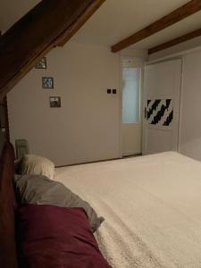 Postel nebo postele na pokoji v ubytování Mikulas Guest House