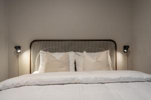 Voodi või voodid majutusasutuse Enter Skansen Hotel toas
