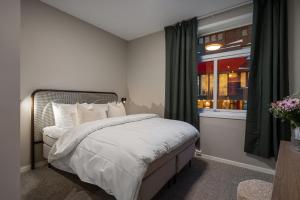 Voodi või voodid majutusasutuse Enter Skansen Hotel toas