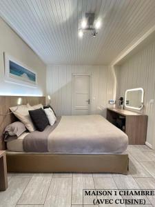 a bedroom with a large bed in a room at Casa Méline - Disneyland Paris in Montry +14 photos