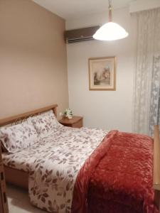 Ένα ή περισσότερα κρεβάτια σε δωμάτιο στο Mina's apartment