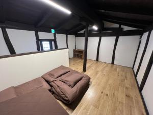 Letto o letti in una camera di ほぼ家