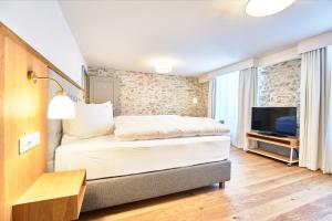 Letto o letti in una camera di Hotel Weissenstein