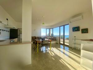 Μια τηλεόραση ή/και κέντρο ψυχαγωγίας στο Villa Odetta - appartamento Attico