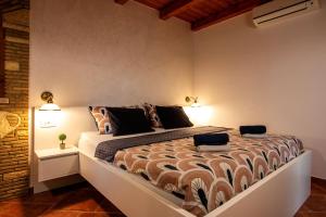 a bedroom with a large bed in a room at Studio Mateo in Rovinjsko Selo