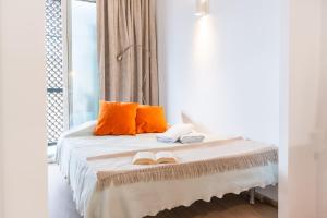 Ένα ή περισσότερα κρεβάτια σε δωμάτιο στο Loft privado reformado centro Girona 3min AVE