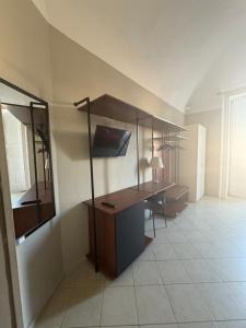 TV a/nebo společenská místnost v ubytování Santuzza Art Hotel Catania