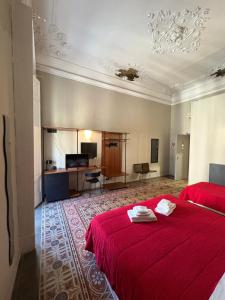 Postel nebo postele na pokoji v ubytování Santuzza Art Hotel Catania