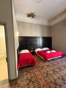 Postel nebo postele na pokoji v ubytování Santuzza Art Hotel Catania