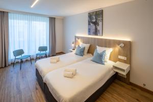 Postel nebo postele na pokoji v ubytování Hotel Den Briel + 28 fotografií
