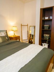 Postel nebo postele na pokoji v ubytování Cozy minimal suite