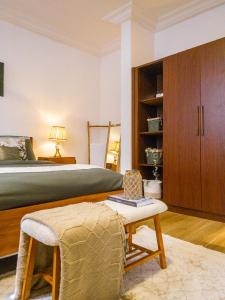 Postel nebo postele na pokoji v ubytování Cozy minimal suite