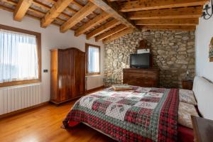 Posteľ alebo postele v izbe v ubytovaní Holiday House Petrarca