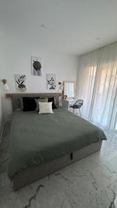 Ένα ή περισσότερα κρεβάτια σε δωμάτιο στο Inaya Home for you appt 3 Pièces Menton