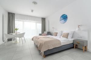 Posteľ alebo postele v izbe v ubytovaní Your Holidays Aquamarina PRIMA