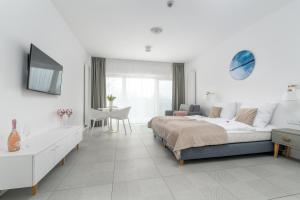 Posteľ alebo postele v izbe v ubytovaní Your Holidays Aquamarina PRIMA