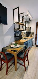 Kuchyň nebo kuchyňský kout v ubytování Leaf apartment