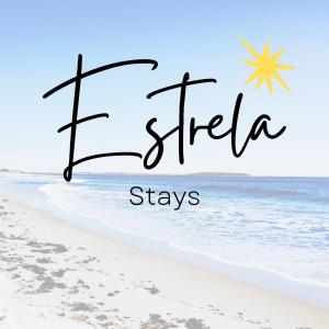 a picture of the beach with the words trek stays at 'ESTRELA STAYS' in Lagos