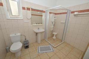 Koupelna v ubytování Hotel Kiani Akti