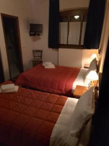 Postel nebo postele na pokoji v ubytování ΞΕΝΩΝΑΣ ΕΣΠΕΡΟΣ - Guest house Esperos