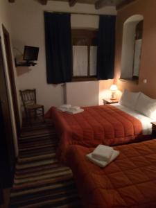 Postel nebo postele na pokoji v ubytování ΞΕΝΩΝΑΣ ΕΣΠΕΡΟΣ - Guest house Esperos