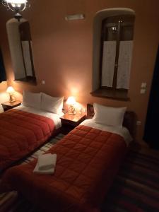 Postel nebo postele na pokoji v ubytování ΞΕΝΩΝΑΣ ΕΣΠΕΡΟΣ - Guest house Esperos