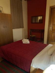 Postel nebo postele na pokoji v ubytování ΞΕΝΩΝΑΣ ΕΣΠΕΡΟΣ - Guest house Esperos