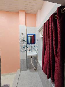TV a/nebo společenská místnost v ubytování Shri Mahaveer Residency + 21 fotografií