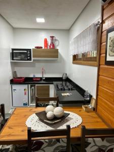Η κουζίνα ή μικρή κουζίνα στο Loft JC dos Reis